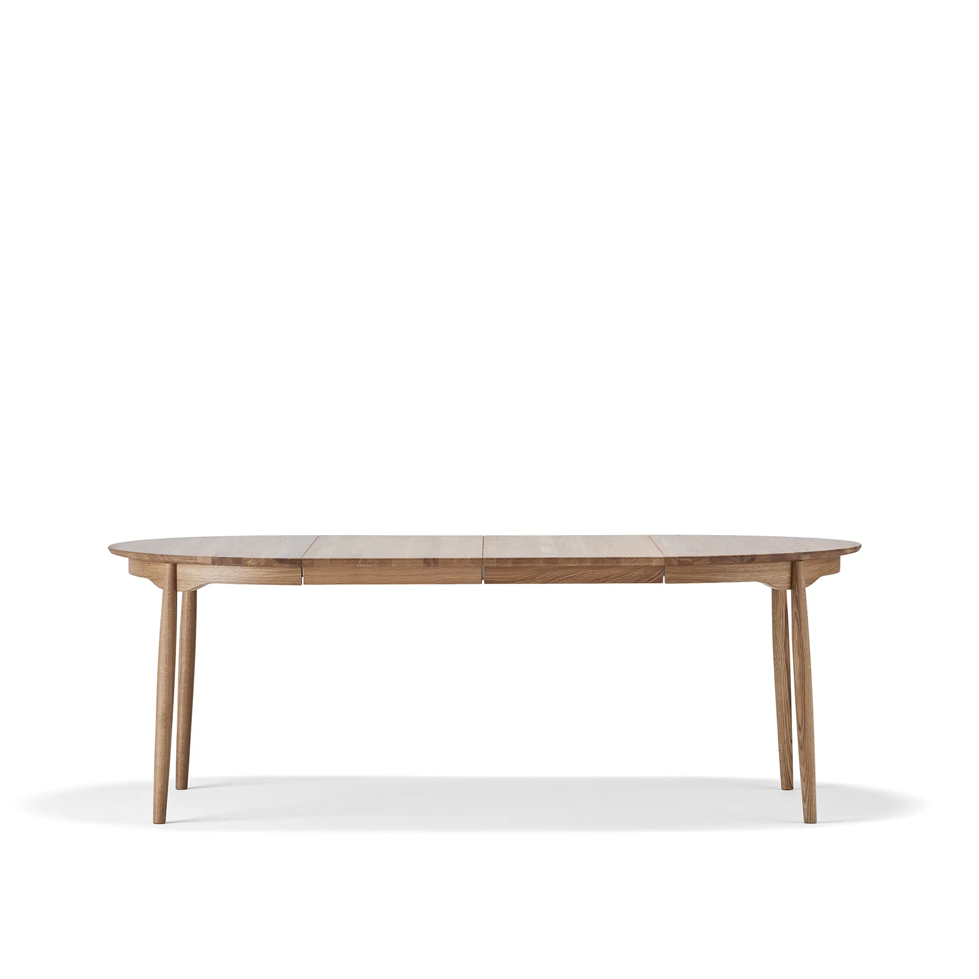 Carl spisebord Ø115 cm med ileggsplate