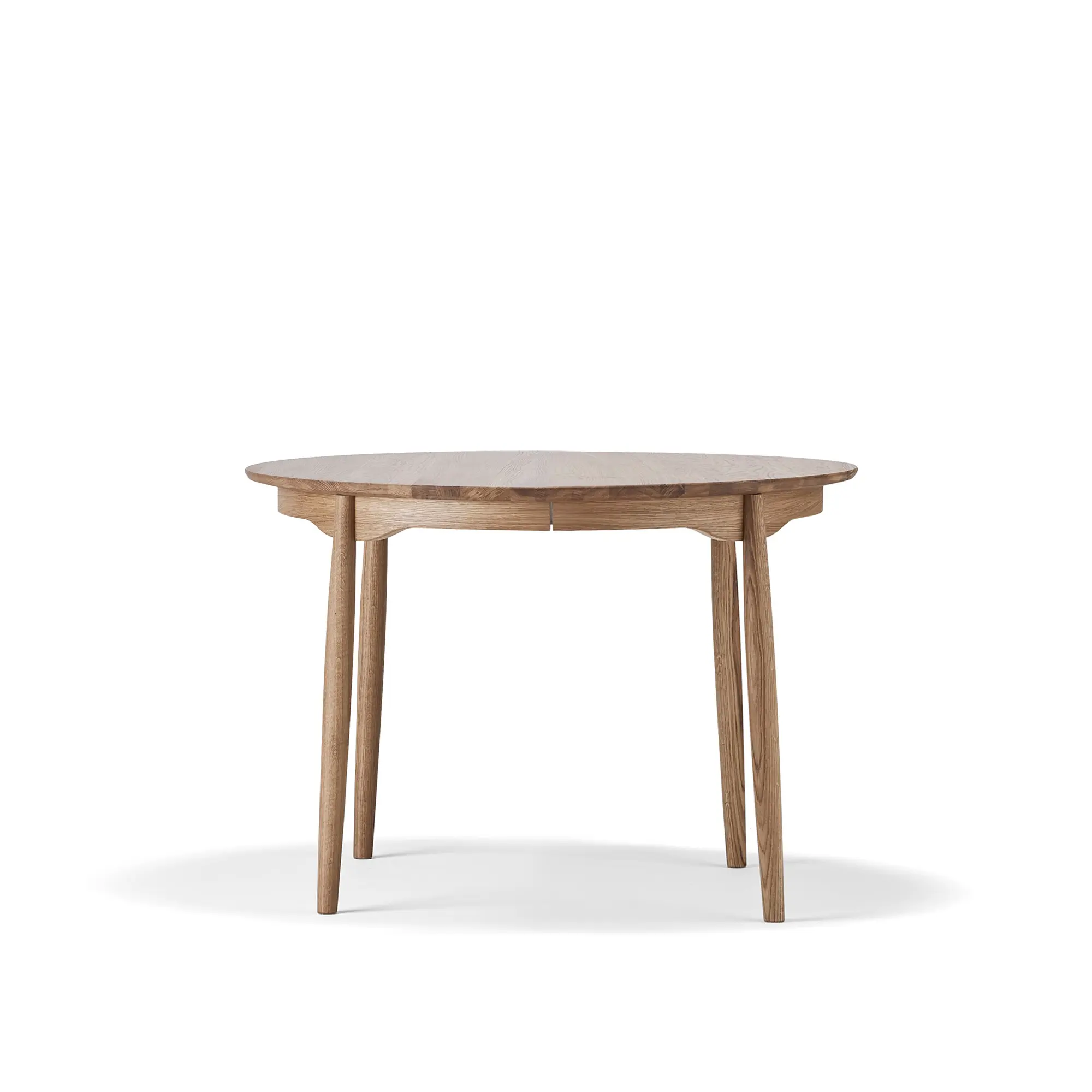 Carl spisebord Ø115 cm delbart – Eik Naturlig Olje